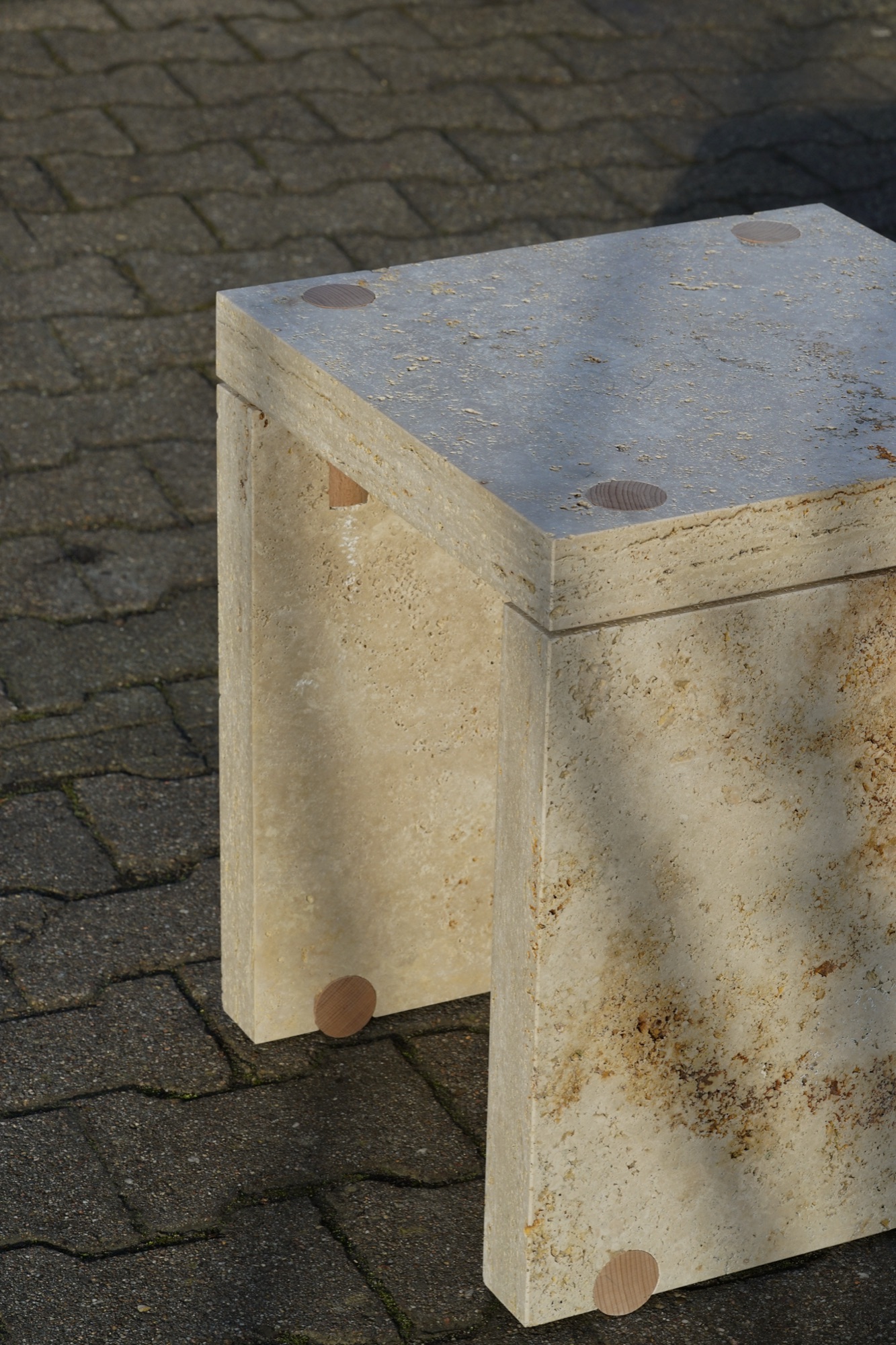 humidity — stone stool held together by expanding wood