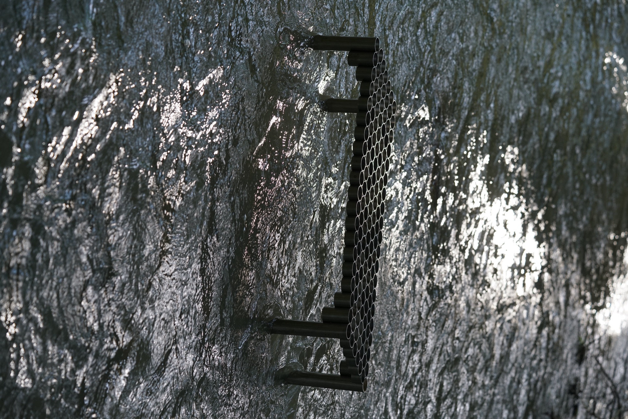 intersections — adjustable grid system of stainless steel sleeves