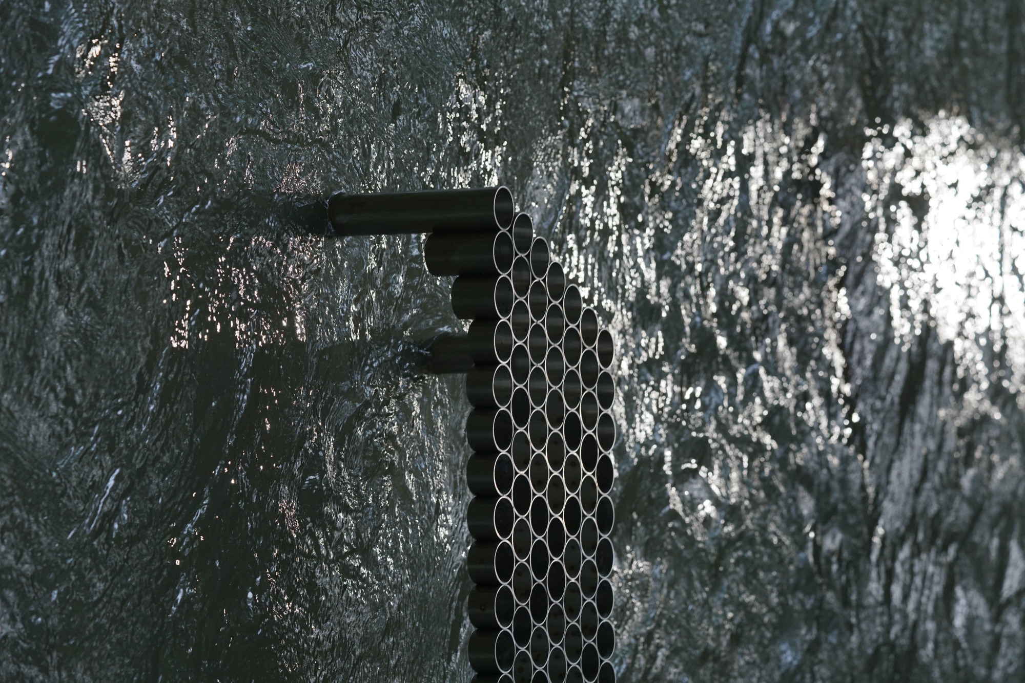 intersections — adjustable grid system of stainless steel sleeves