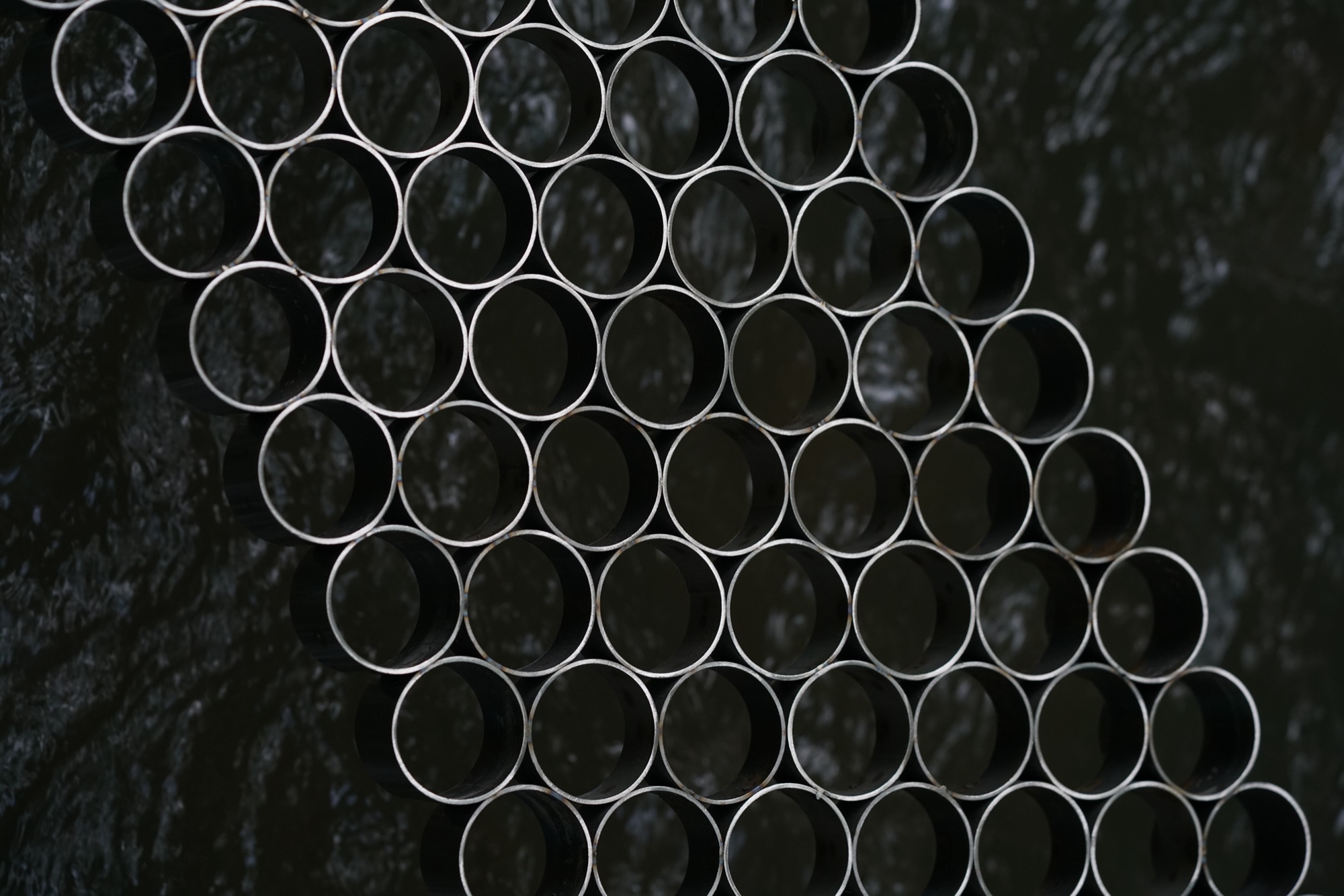 intersections — adjustable grid system of stainless steel sleeves